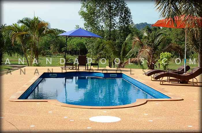 The Neptune Pool A stunning Saturn model fiberglass pool at sunset.